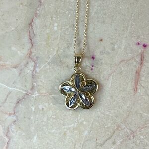 Elegant 10K Gold and Silver Flower Pendant Necklace